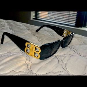 Balenciaga black and gold rectangular frame BB Sunglasses.